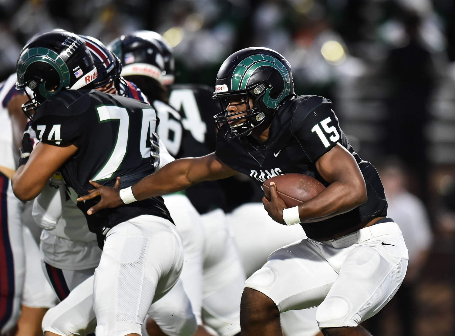 Katy, Tx. Oct. 10, 2019: Mayde Creek's Julius Loughridge (15) carries the ball during a conference game between Tompkins Falcons and Mayde Creek Rams at Rhodes Stadium. (Photo by Mark Goodman / Katy Times)